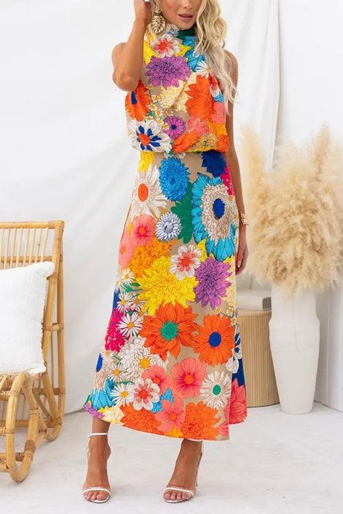 Estate | Robe maxi sans manches avec nœud à la taille et imprimé floral