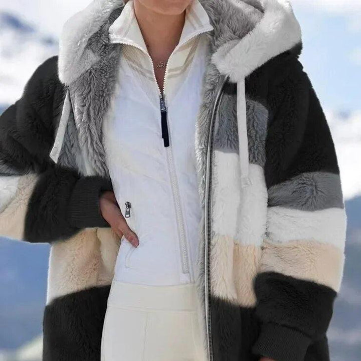Aléana™ – La veste d’hiver élégante et chaude avec capuche et fermeture éclair